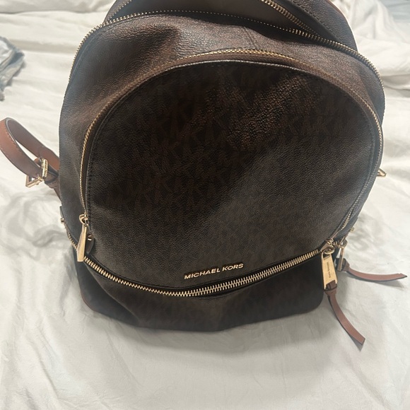 Michael Kors Handbags - Michael Kors Monogram Shelia Backpack